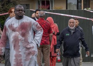 Alabi Lateef with a blood-stained cloth after the attack on Linwood Mosque on March 15, 2019 [CNN]