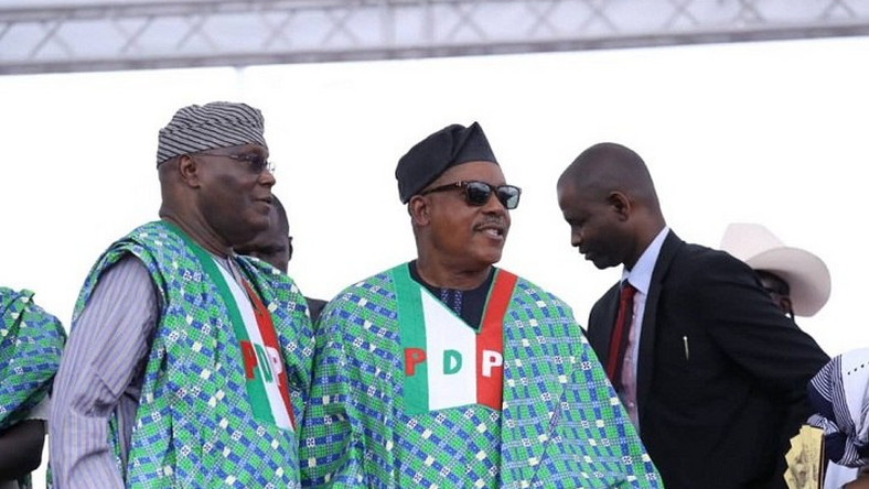 Former vice president, Atiku Abubakar, with the PDP's national chairman, Uche Secondus